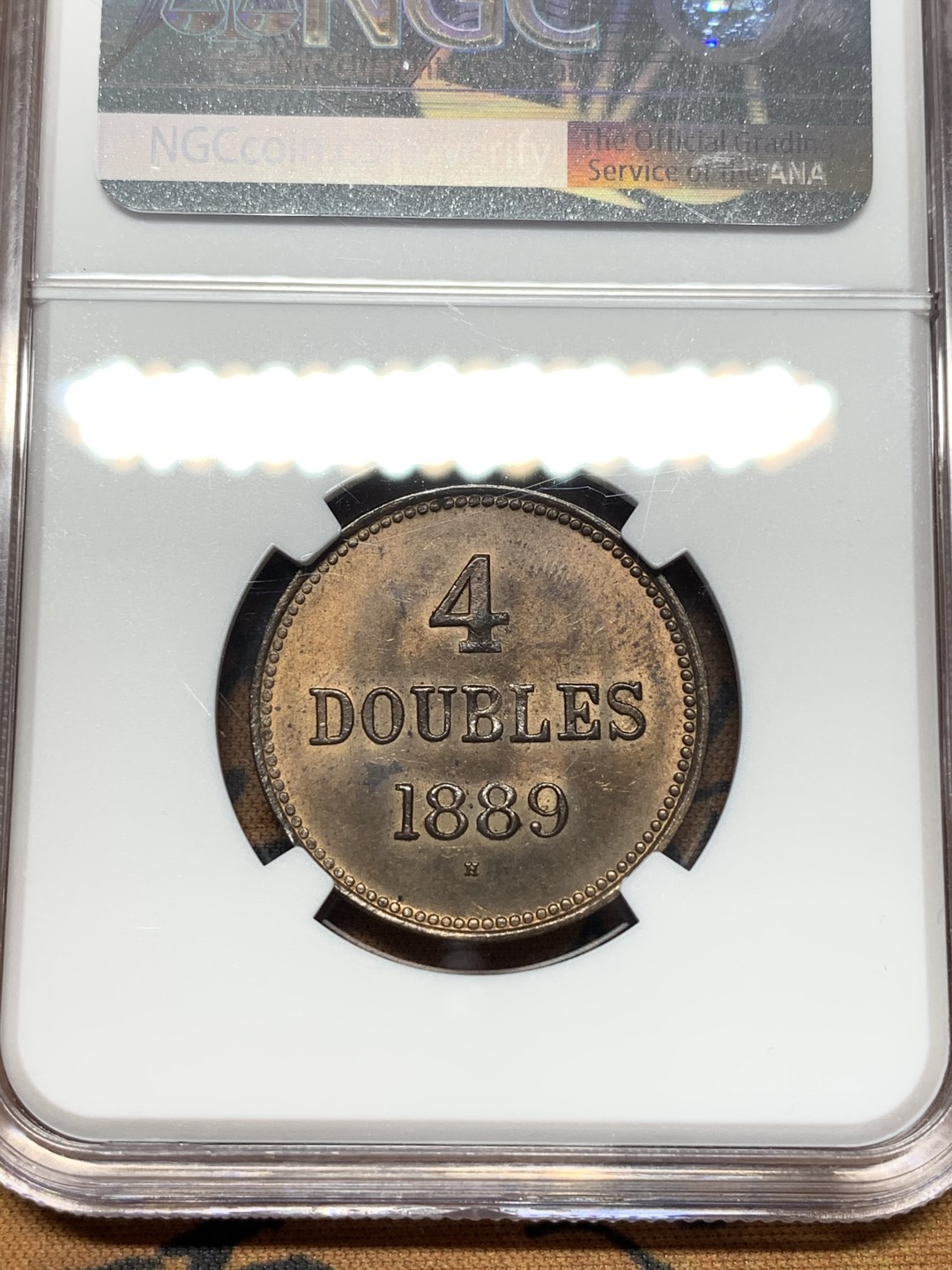 《竞宝斋》第112场-周日，周一 ，2场连拍（全场包邮） NGC MS63 RB英属格恩济1910H4道布 更高分仅三枚