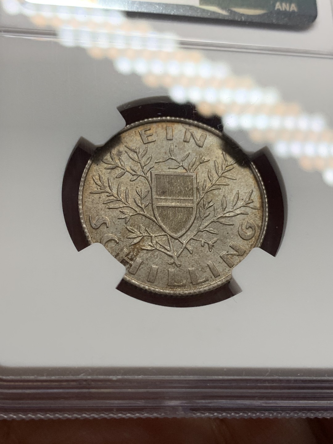 《竞宝斋》第112场-周日，周一 ，2场连拍（全场包邮） 第三名 NGC-MS64 奥地利1924年 维也纳会议大厅 1先令银币 带点月牙彩 非常漂亮