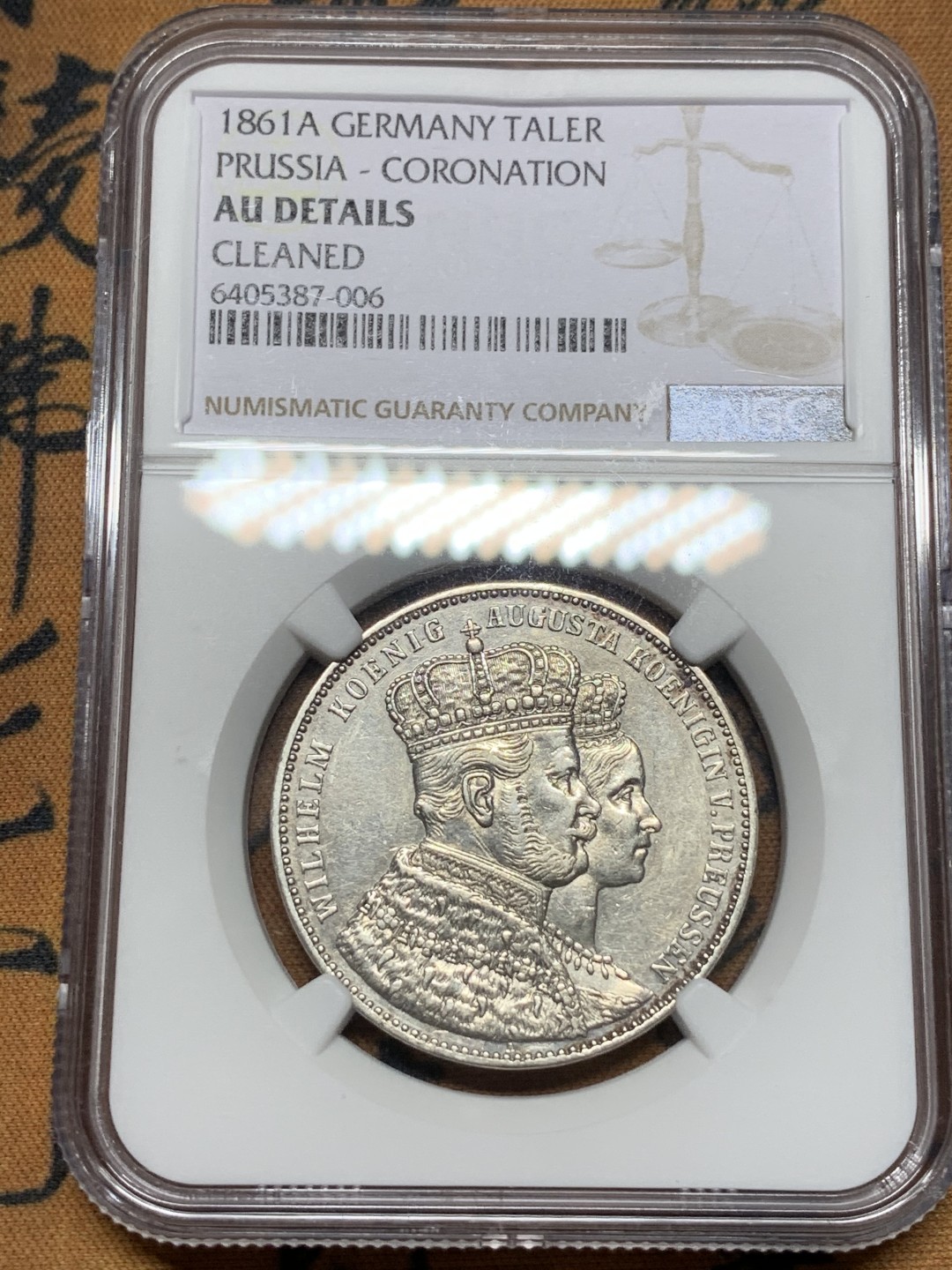 《竞宝斋》第112场-周日，周一 ，2场连拍（全场包邮） NGC-AUD  德国  1861  1泰勒  毛衣泰勒银币