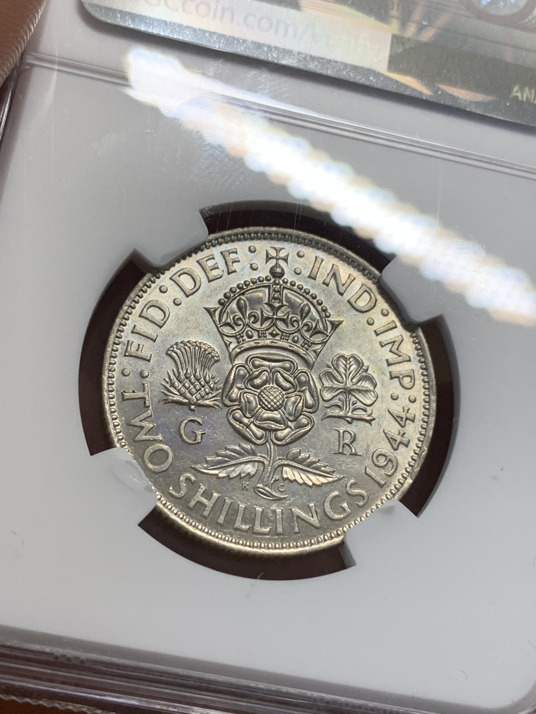 《竞宝斋》第112场-周日，周一 ，2场连拍（全场包邮） NGC-AU55 英国1944年 乔六2先令银币 原光好品