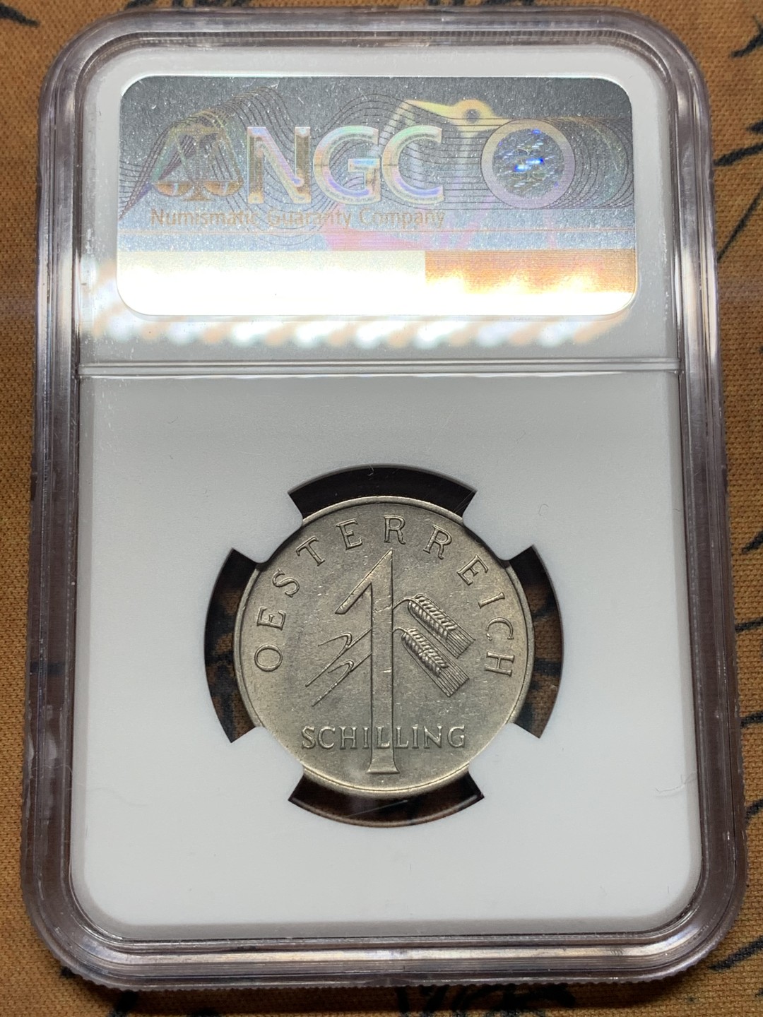 《竞宝斋》第112场-周日，周一 ，2场连拍（全场包邮） 冠军分 NGC-MS62 奥地利1934年 双头鹰1先令 镍币