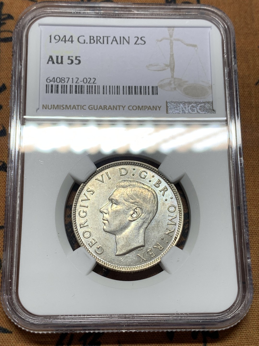 《竞宝斋》第112场-周日，周一 ，2场连拍（全场包邮） NGC-AU55 英国1944年 乔六2先令银币 原光好品