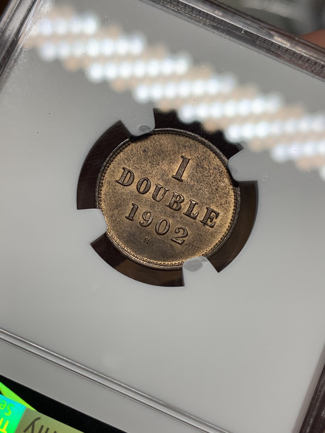 《竞宝斋》第112场-周日，周一 ，2场连拍（全场包邮） NGC MS64 RB英属格恩济1902H1道布 季军分级 光泽细腻