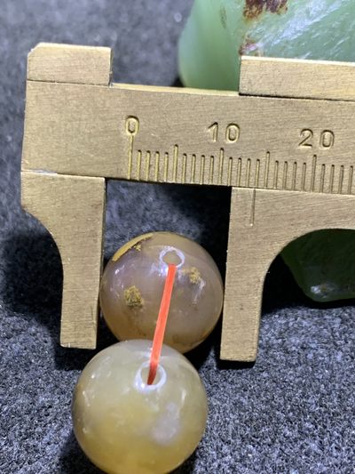 天然阜新黄金水草玛瑙腰珠一对 天然阜新黄金水草玛瑙腰珠一对