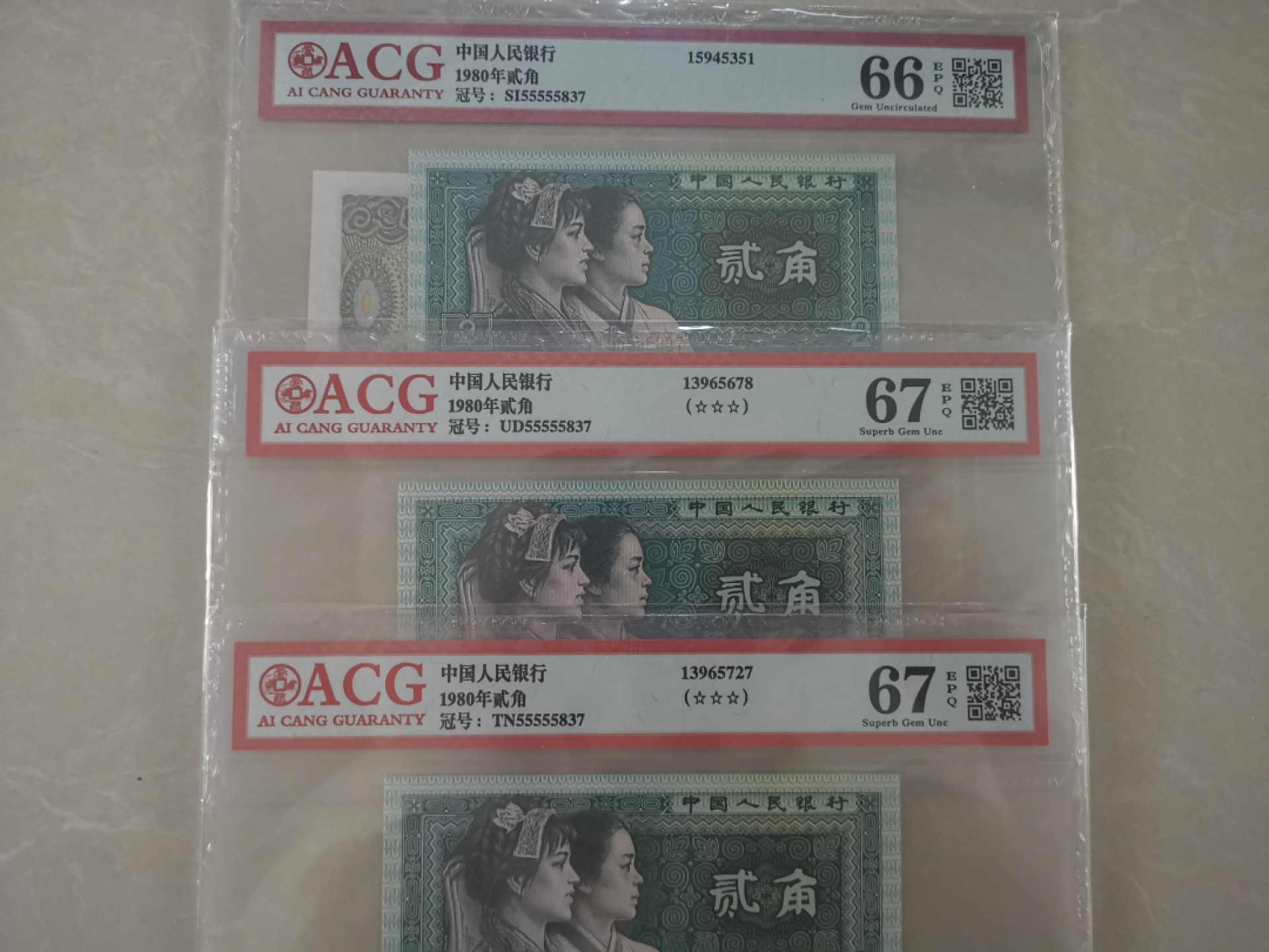8002三包胎评级币，55555老虎头，市面双胞胎多，三胞胎较少，三张一组，每组180！