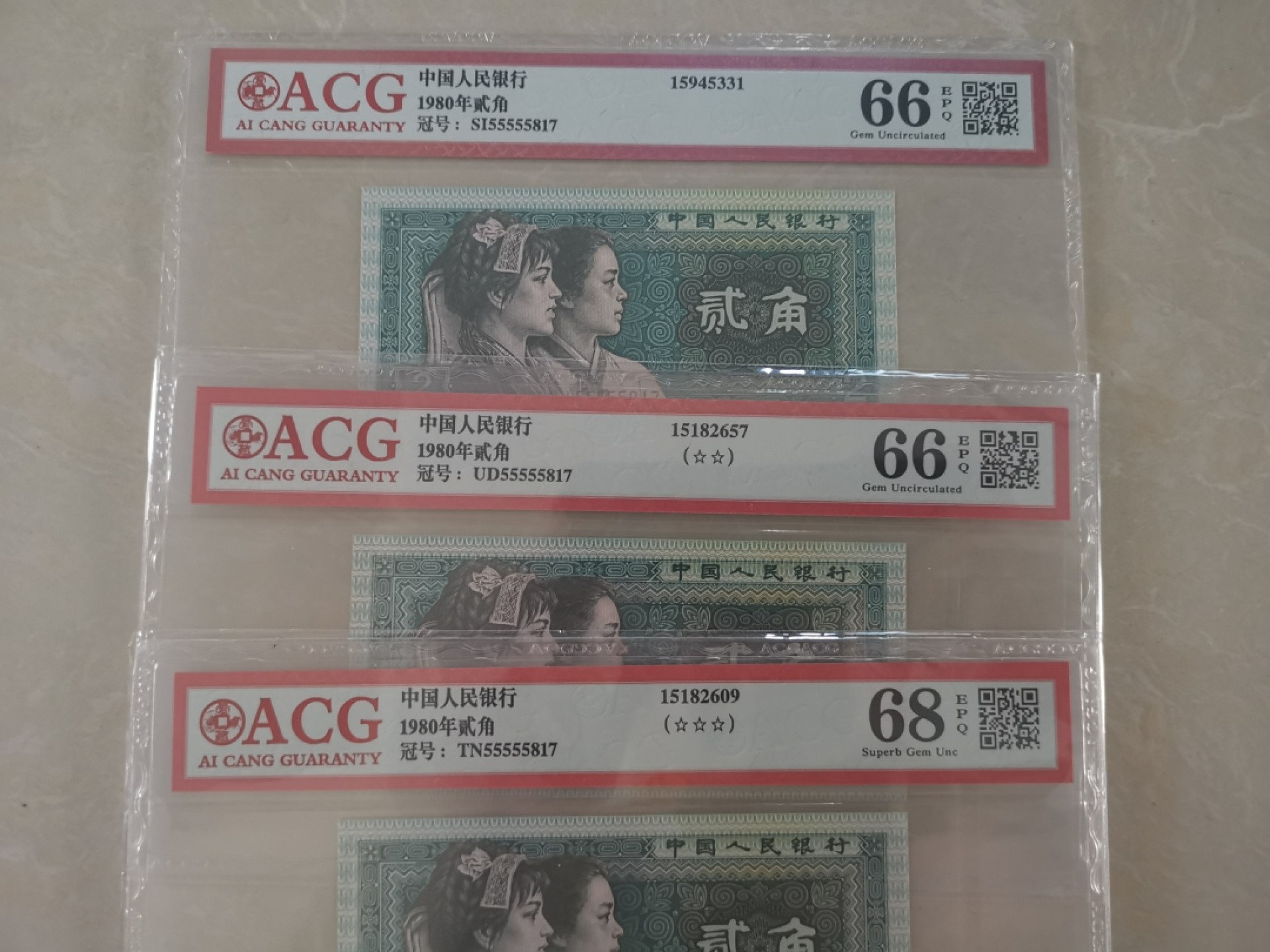 8002三包胎评级币，55555老虎头，市面双胞胎多，三胞胎较少，三张一组，每组180！
