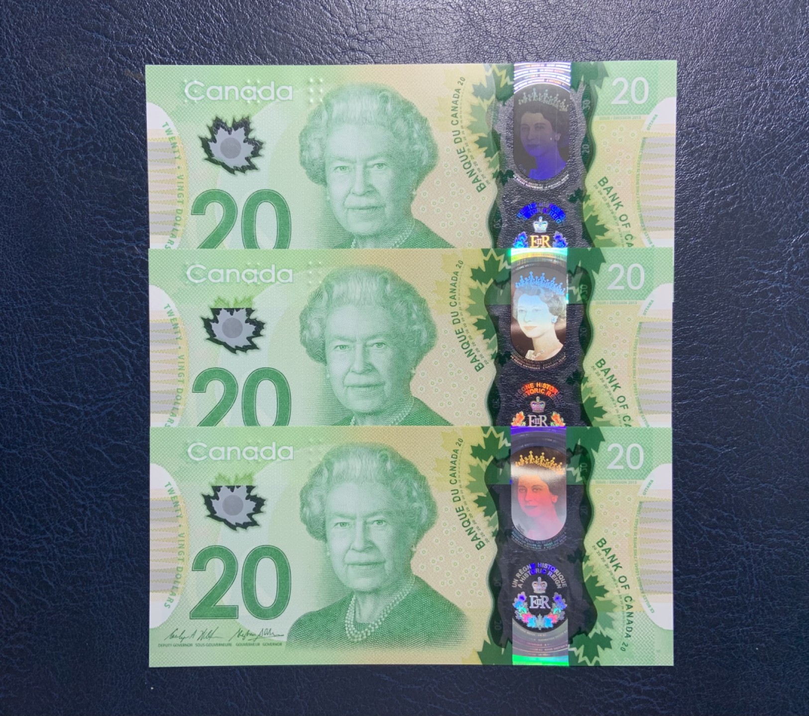 收藏联盟Quantum Auction 第205期拍卖 加拿大2015年20元纪念钞三连号 品相全新UNC 号码无47 女王是在位时间最长的君主