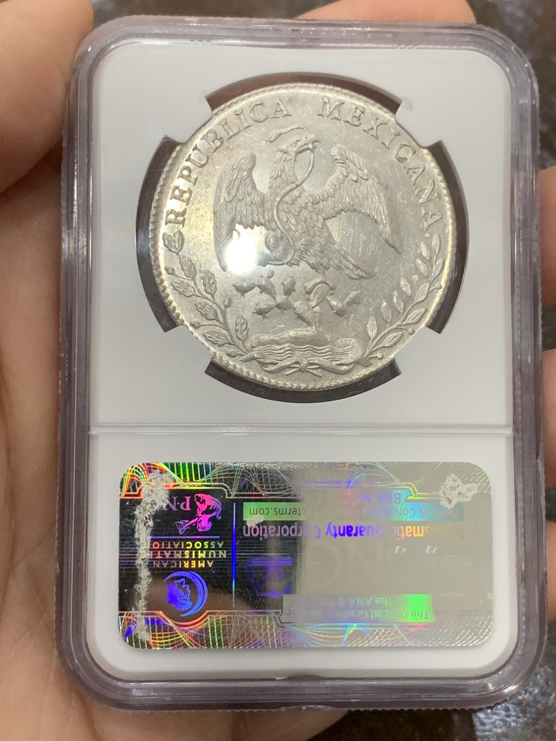 《竞宝斋》第113场-周日，周一 ，2场连拍（全场包邮） NGC-MS62 墨西哥1897年 8瑞尔 花边鹰洋 银币 镜面效果明显 车轮转光 同品相中的战斗机