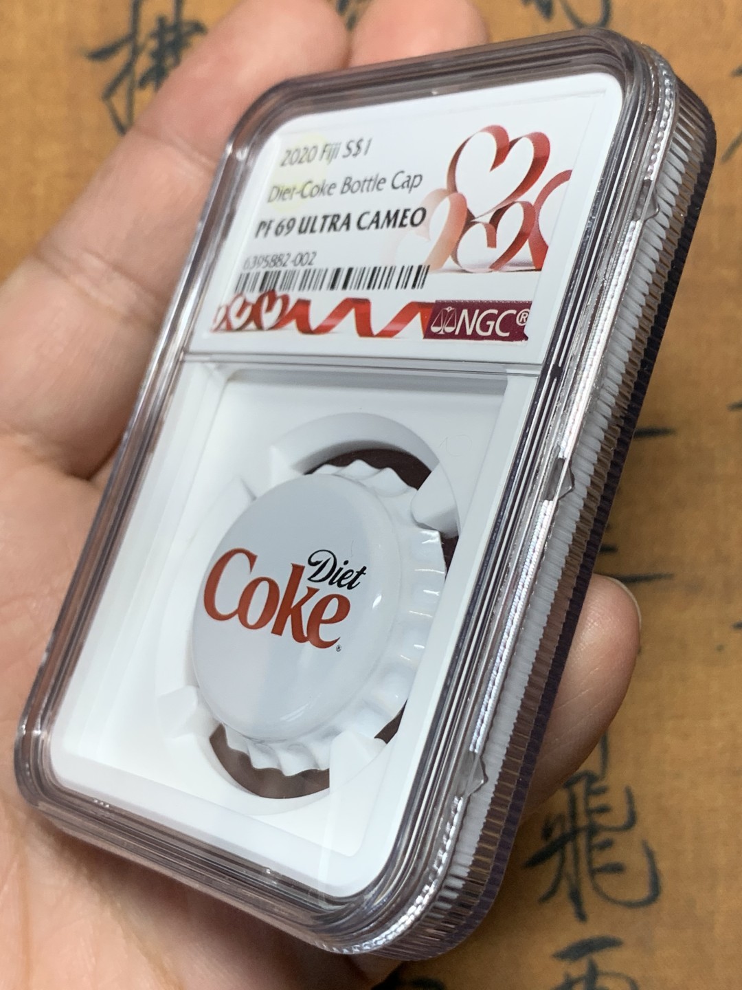 《竞宝斋》第113场-周日，周一 ，2场连拍（全场包邮） NGC PF69UC 2020 斐济可乐 瓶盖精制银币 情人节标签 比较有意义