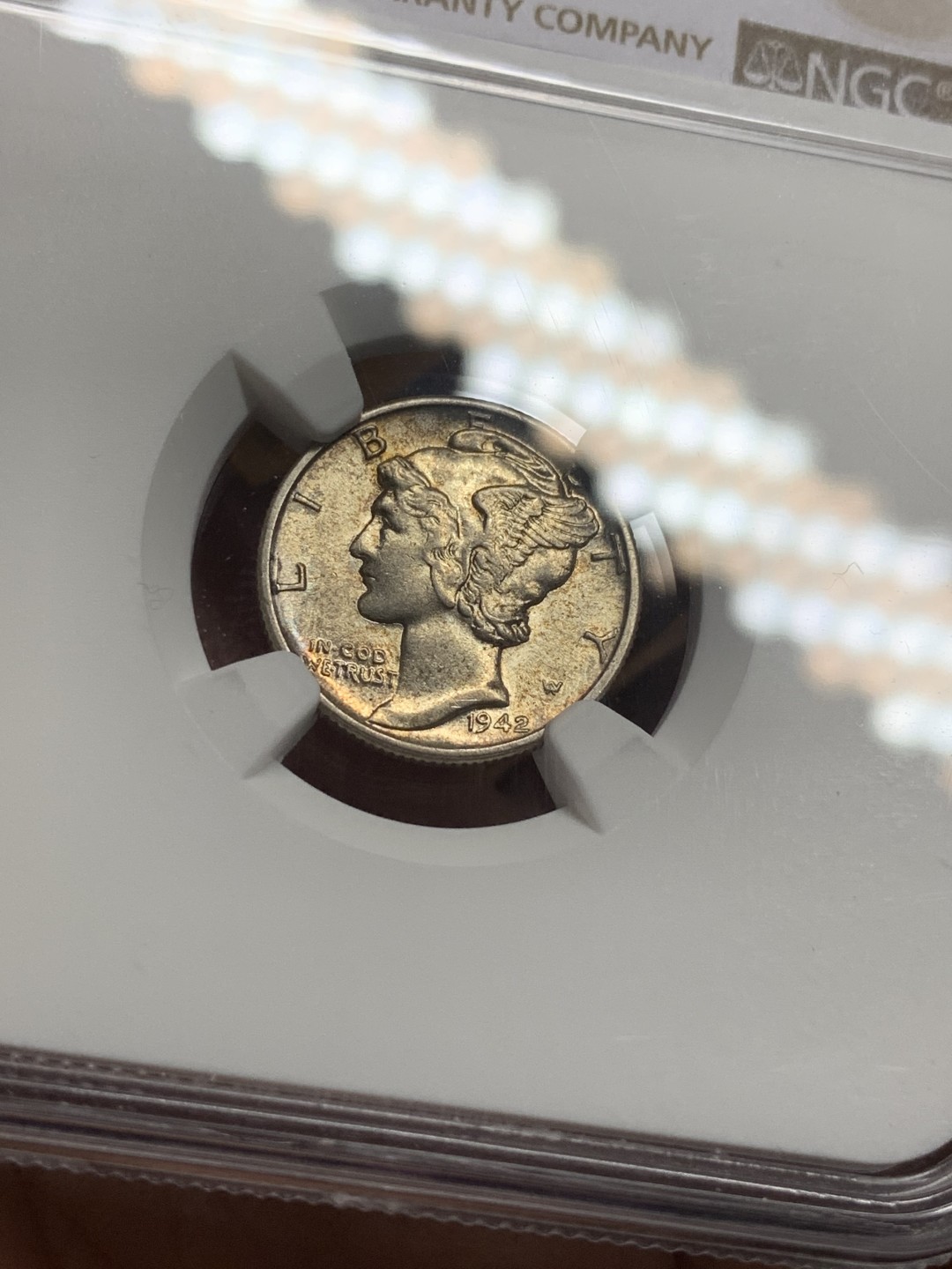 《竞宝斋》第113场-周日，周一 ，2场连拍（全场包邮） NGC AU58 美国 1942年 小飞侠 10分银币 包浆不错