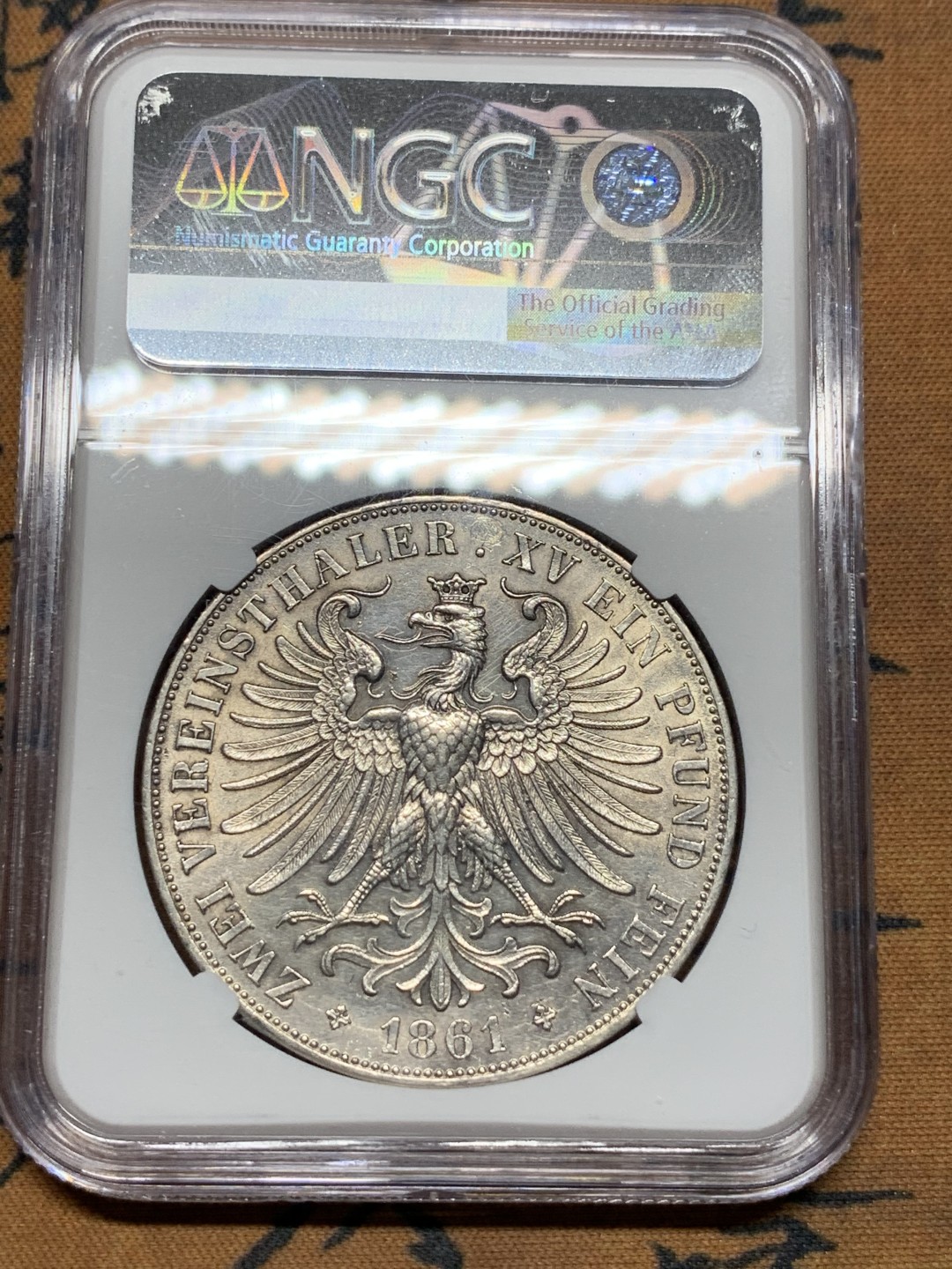 《竞宝斋》第113场-周日，周一 ，2场连拍（全场包邮） NGC UNC 德国法兰克福 1861年 少女2泰勒 银币 37克的大银币 价格明显上涨的热门品种