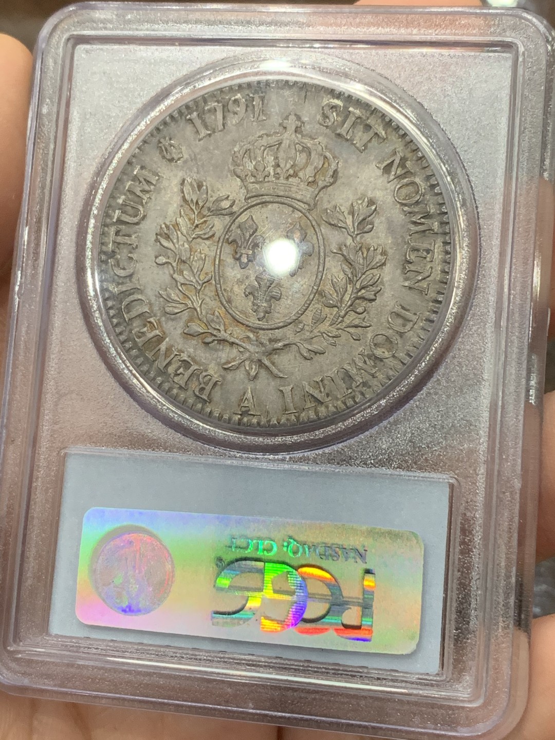 《竞宝斋》第113场-周日，周一 ，2场连拍（全场包邮） PCGS-MS62 1791年 法国路易十六，法国大革命时期1埃居大银币，PCGS老盒低评，人像完整，欧洲纸袋老包浆，币整体紫罗兰色颇为吸引人。