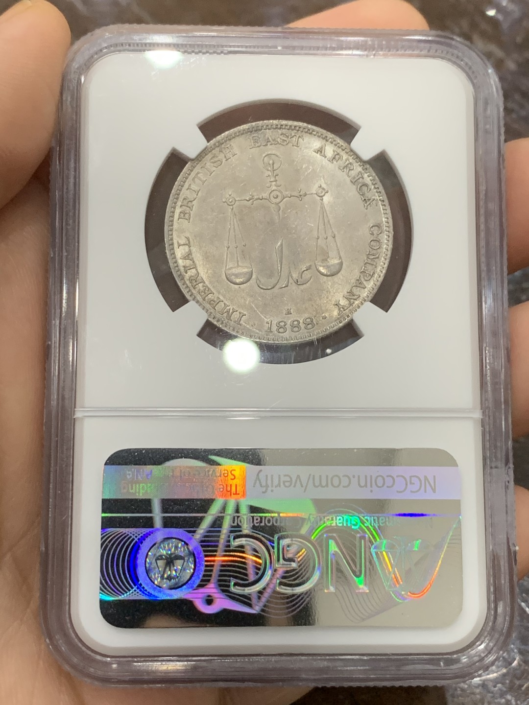 《竞宝斋》第113场-周日，周一 ，2场连拍（全场包邮） NGC-MS62 1888年蒙巴萨1卢比银币少见MS 蒙巴萨是肯尼亚最大的港口，郑和下西洋最远到达的地方，大热门，吉祥年份，浅灰色包浆，状态佳