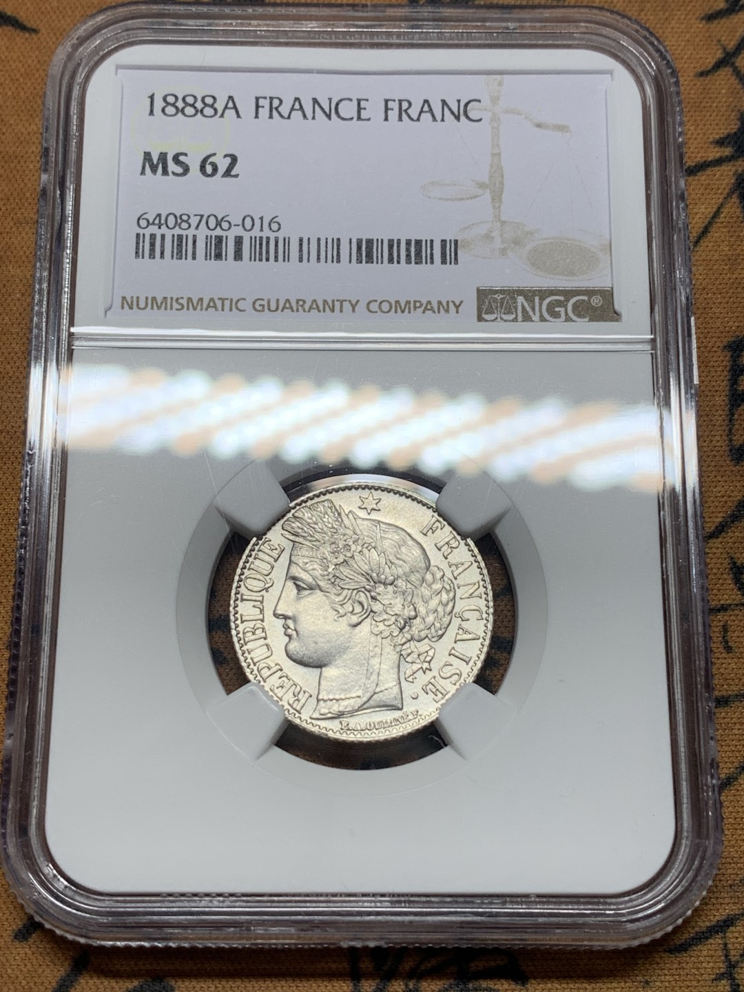 《竞宝斋》第113场-周日，周一 ，2场连拍（全场包邮） NGC-MS62 法国1888年 谷物女神1法郎银币 原光好品 发财年份