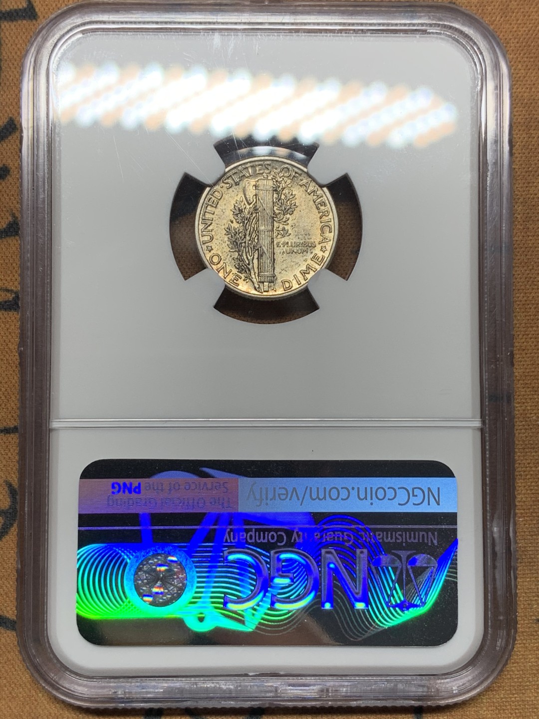 《竞宝斋》第113场-周日，周一 ，2场连拍（全场包邮） NGC AU58 美国 1942年 小飞侠 10分银币 包浆不错