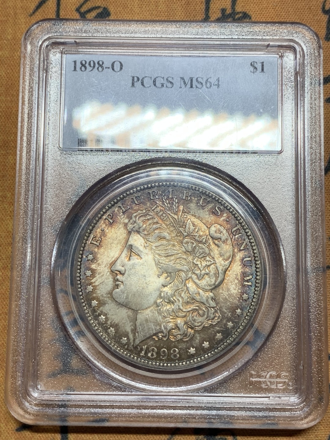 《竞宝斋》第113场-周日，周一 ，2场连拍（全场包邮） PCGS MS64 美国 1898年O版 摩根银元 深五彩包浆 很是漂亮
