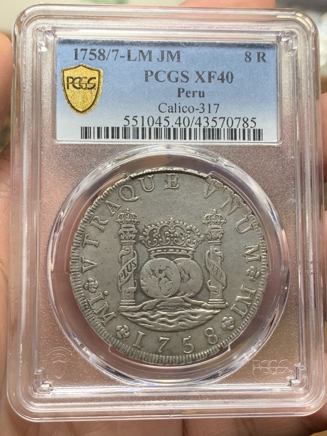 《竞宝斋》第113场-周日，周一 ，2场连拍（全场包邮） 亚军分 PCGS XF40 秘鲁 1758/7 骑字版版 中期 8R 双柱大银币，冠军分是一枚AU50,秘鲁相对不多，骑字的秘鲁更为难得，比较好的品种 请勿错过