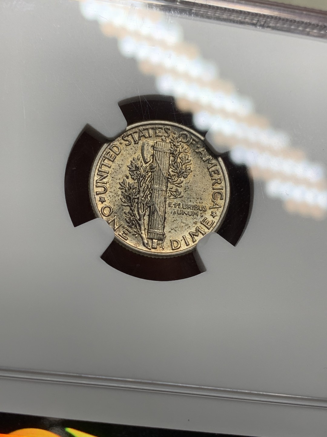 《竞宝斋》第113场-周日，周一 ，2场连拍（全场包邮） NGC AU58 美国 1942年 小飞侠 10分银币 包浆不错