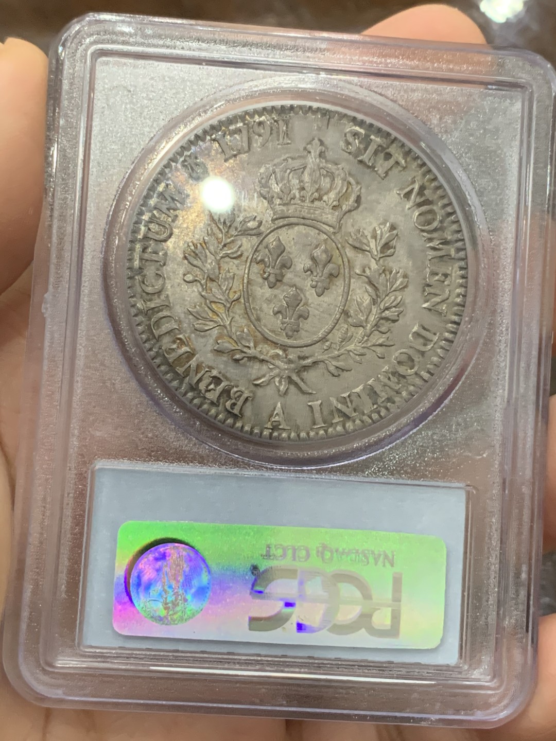 《竞宝斋》第113场-周日，周一 ，2场连拍（全场包邮） PCGS-MS62 1791年 法国路易十六，法国大革命时期1埃居大银币，PCGS老盒低评，人像完整，欧洲纸袋老包浆，币整体紫罗兰色颇为吸引人。
