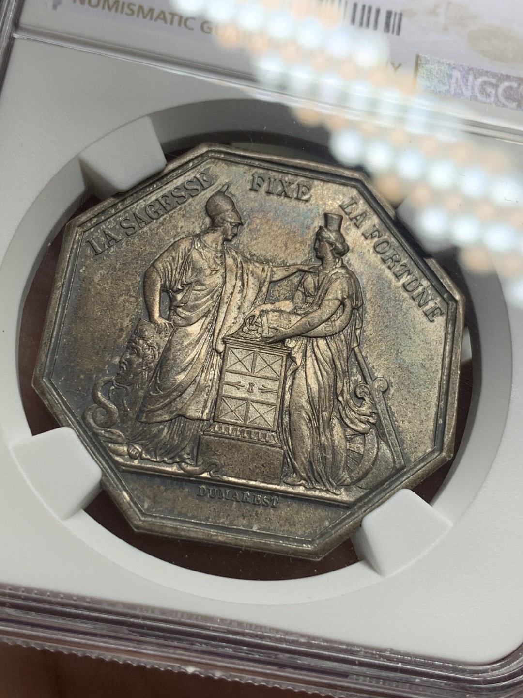 《竞宝斋》第113场-周日，周一 ，2场连拍（全场包邮） NGC MS63 法国 1900年法兰西银行百年纪念八角银章代用币 原味包浆深五彩