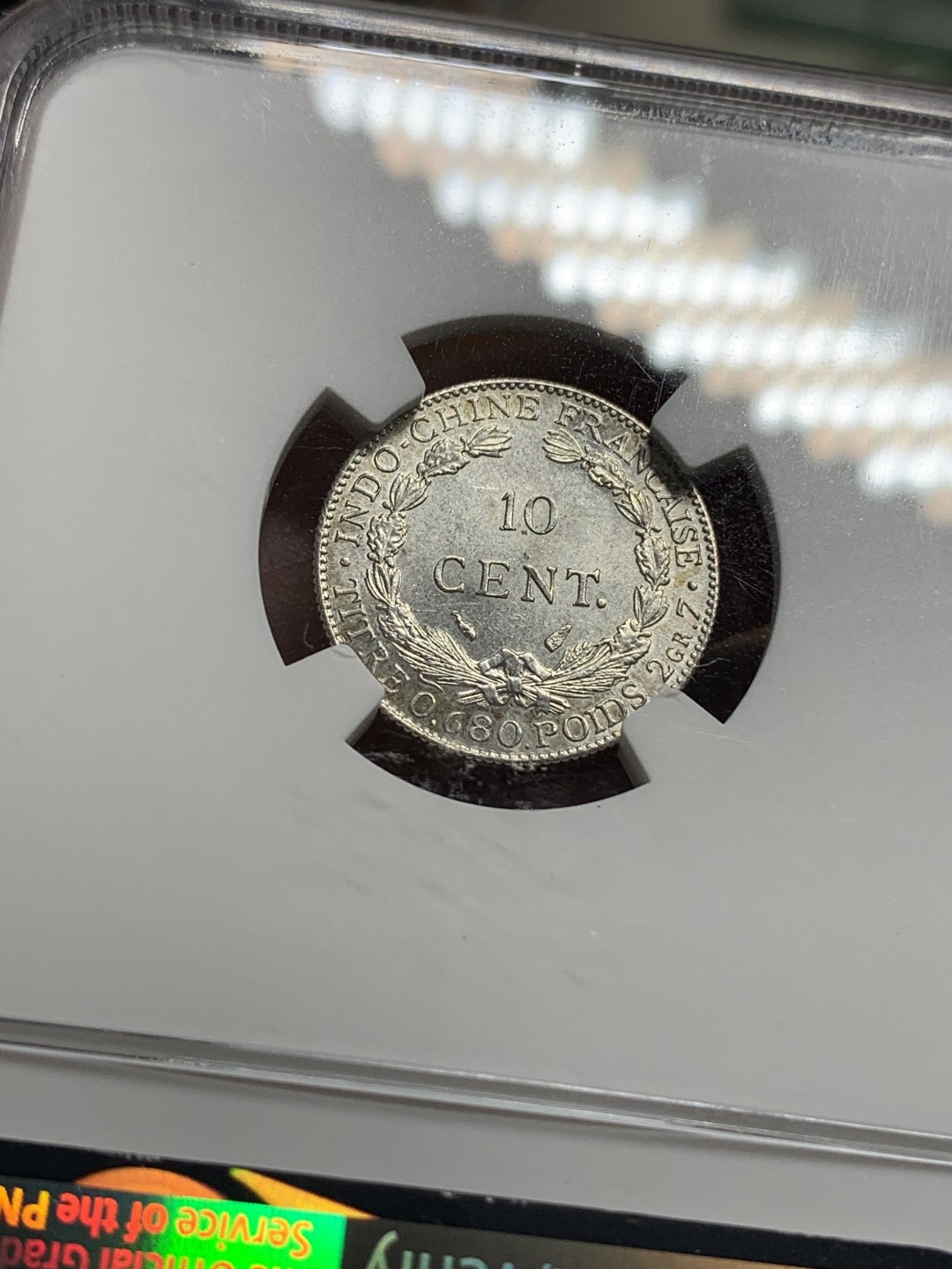 《竞宝斋》第113场-周日，周一 ，2场连拍（全场包邮） NGC MS64 1937年法属印支坐洋10分银币 压印十分好的一枚
