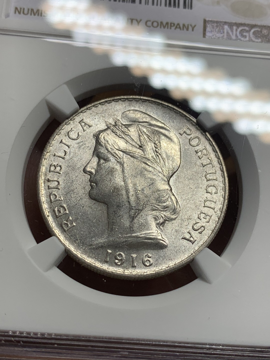 《竞宝斋》第113场-周日，周一 ，2场连拍（全场包邮） NGC-MS63 葡萄牙1916年 自由女神头像 50分银币 原光好品