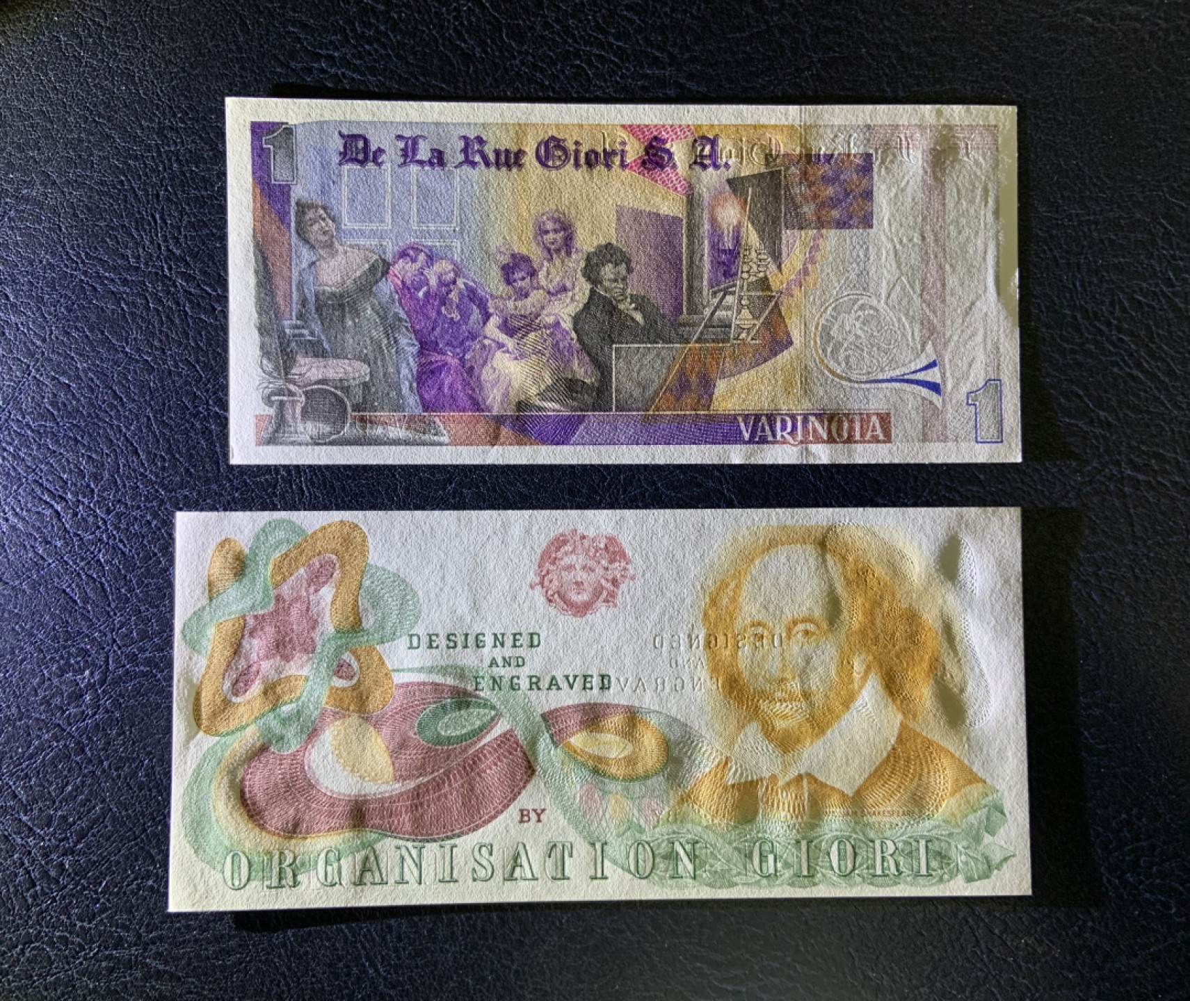 收藏联盟Quantum Auction 第205期拍卖 英国德纳罗公司1元贝多芬(雕刻版)和莎士比亚纪念券(深凹版)测试钞 品相全新UNC