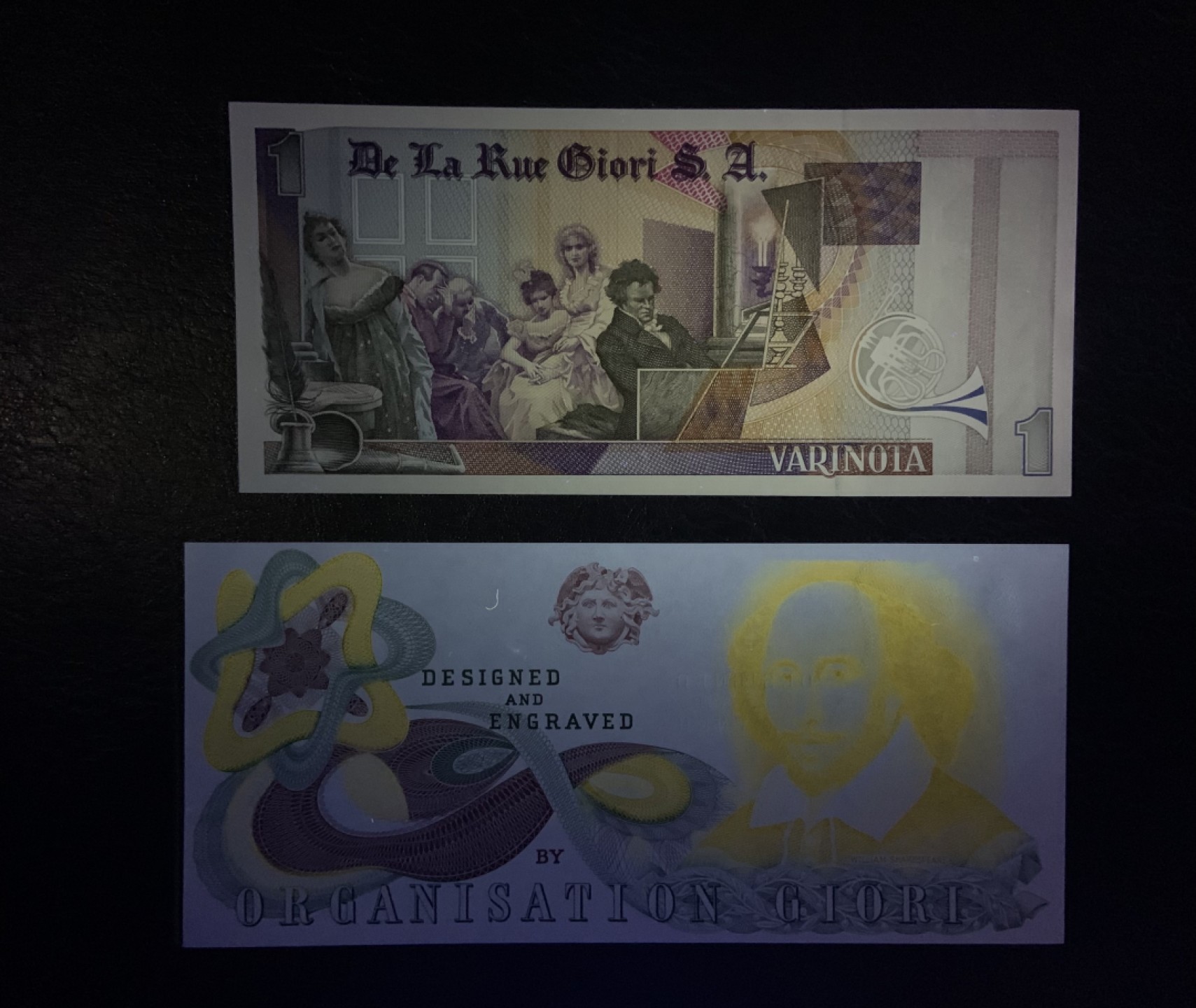 收藏联盟Quantum Auction 第205期拍卖 英国德纳罗公司1元贝多芬(雕刻版)和莎士比亚纪念券(深凹版)测试钞 品相全新UNC