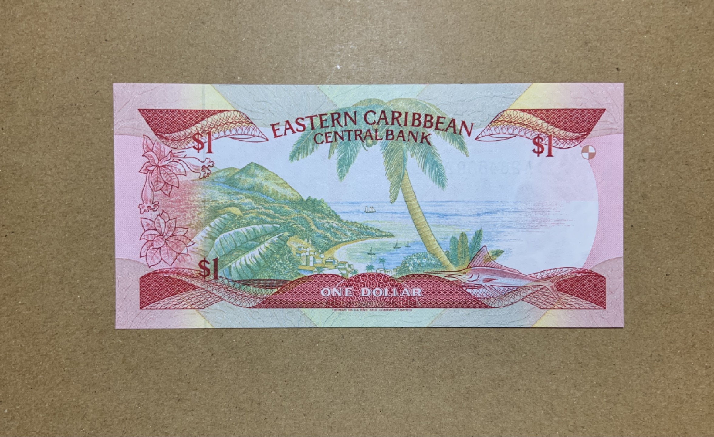 收藏联盟Quantum Auction 第206期拍卖 东加勒比(安提圭)1986年1元 品相全新UNC 首发A冠 小彩背版