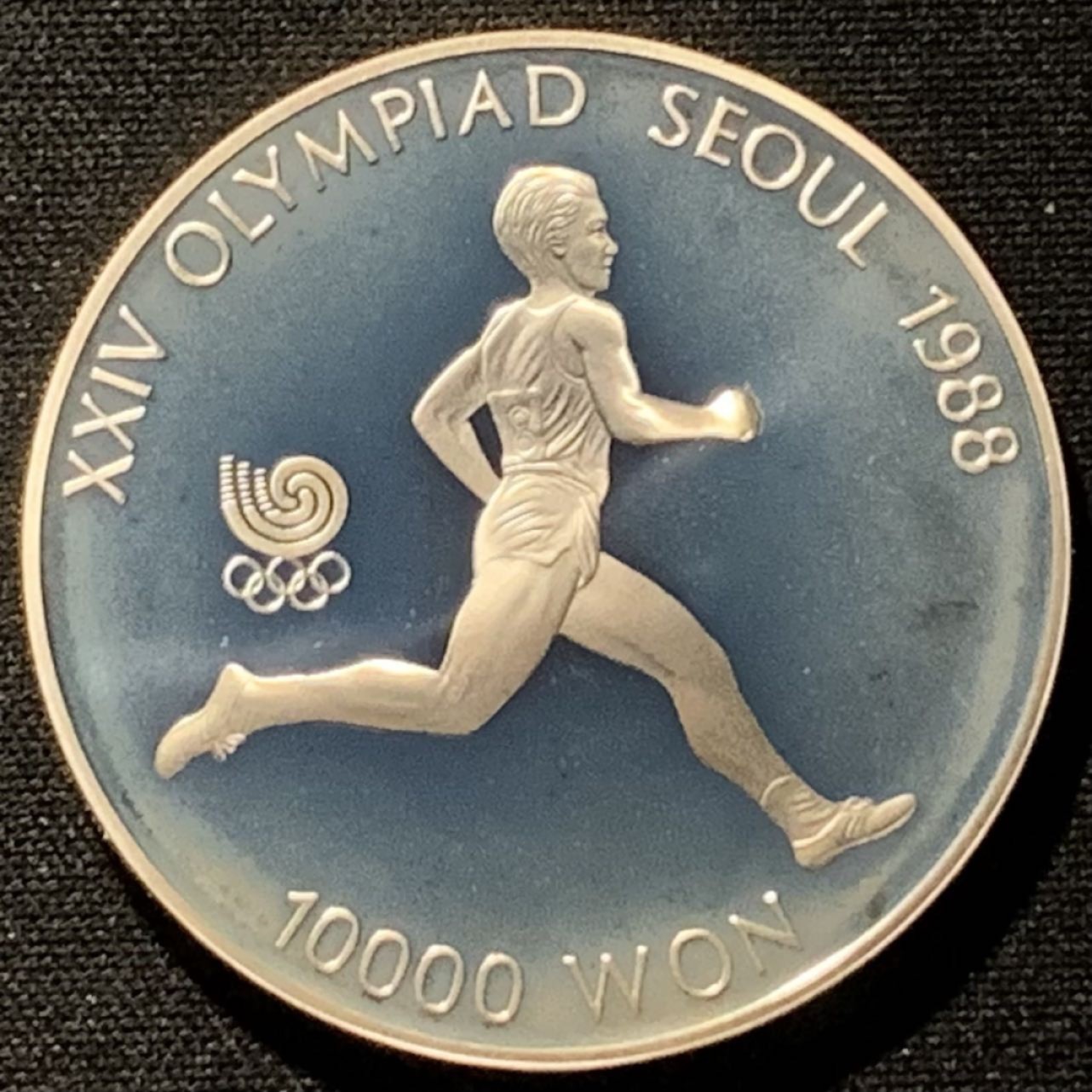 紫瑗钱币——第227期拍卖 韩国 1986年 汉城奥运会 长跑 10000韩元 33.62克 0.925银 精制
