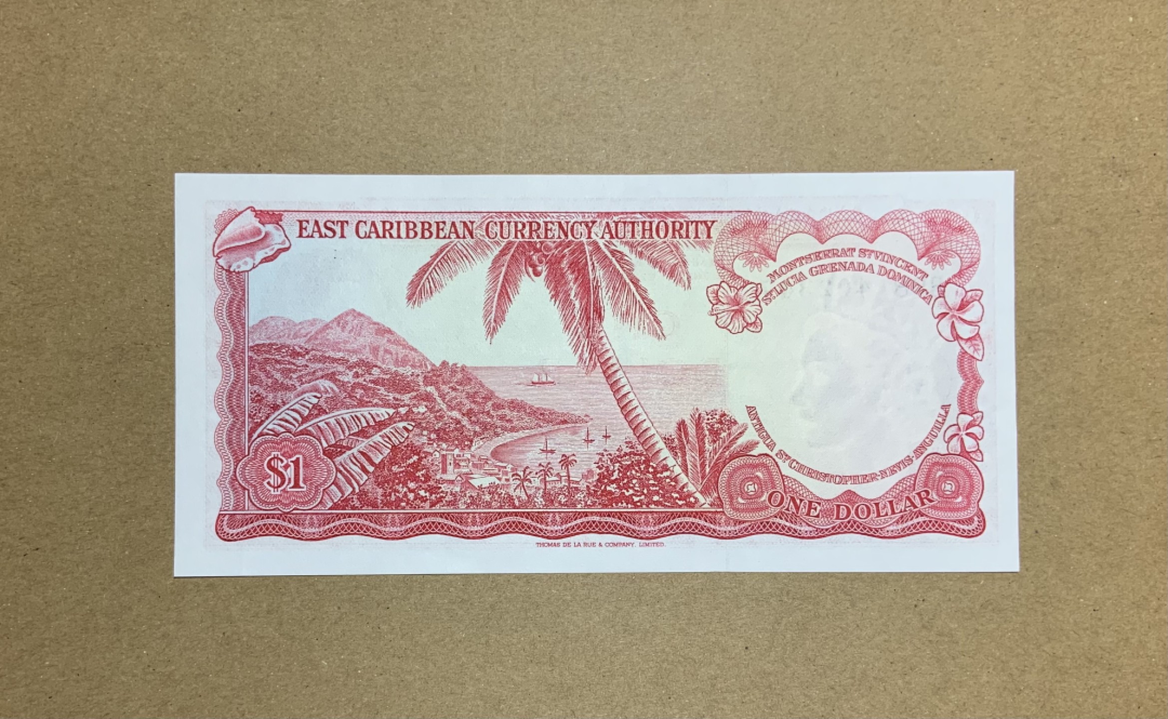 收藏联盟Quantum Auction 第207期拍卖 东加勒比1965年1元 品相AU V字冠