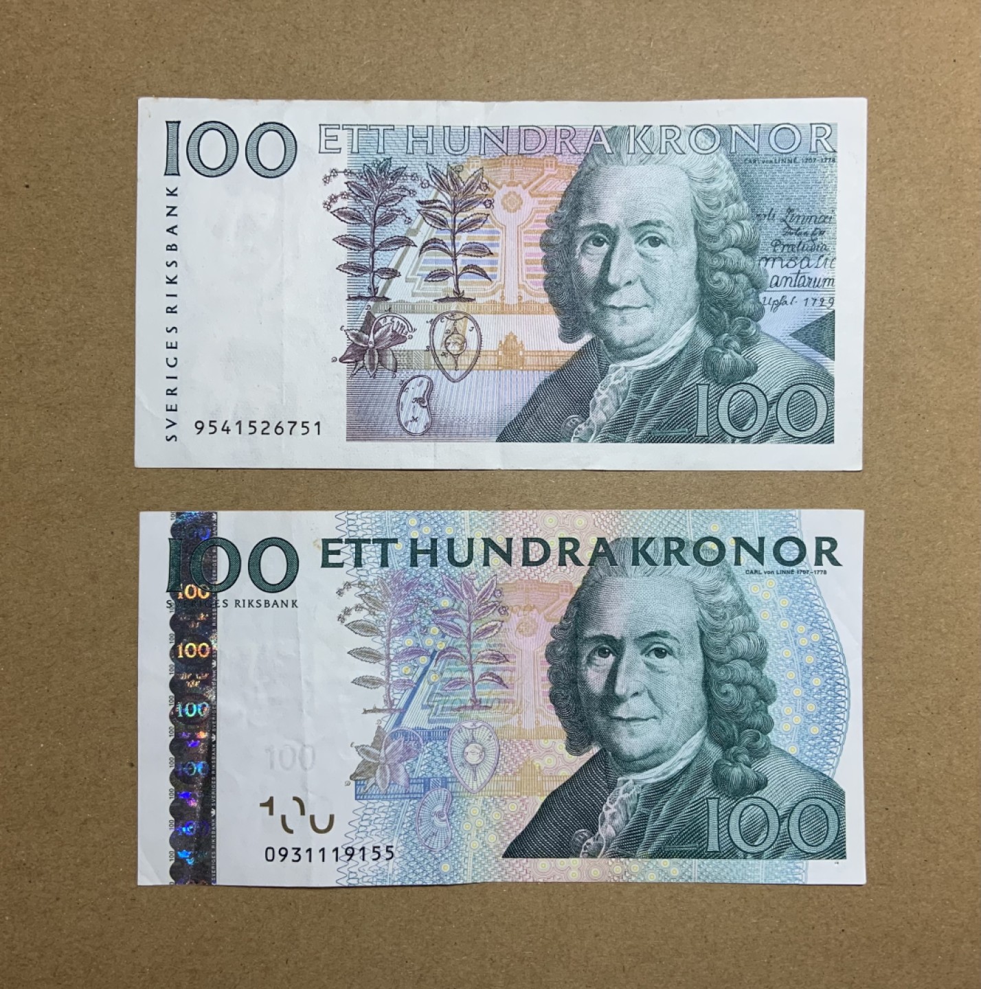 收藏联盟Quantum Auction 第208期拍卖(最后三拍新添测试钞评级币) 瑞典1989-2009年100克朗 品相AU- 不同版本 林奈 极致的文字缩印技术