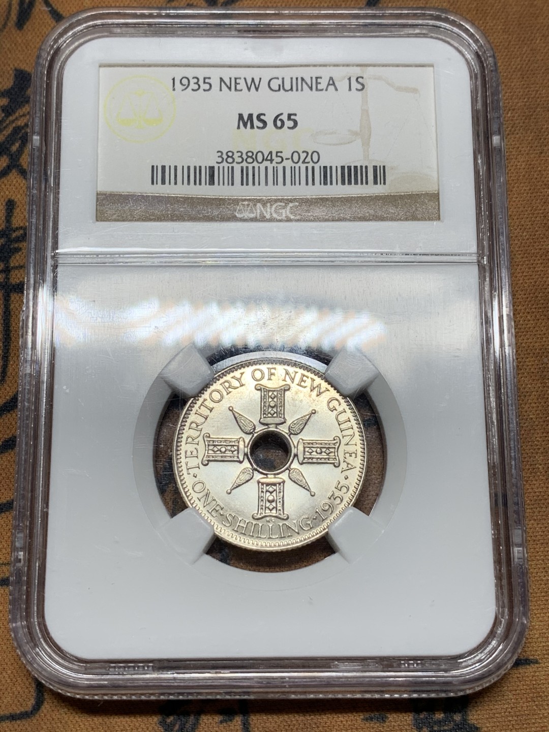 《竞宝斋》第115场-周日，周一 ，2场连拍（全场包邮） NGC MS65 1945 英属 新几内亚1先令 银币 高分难得