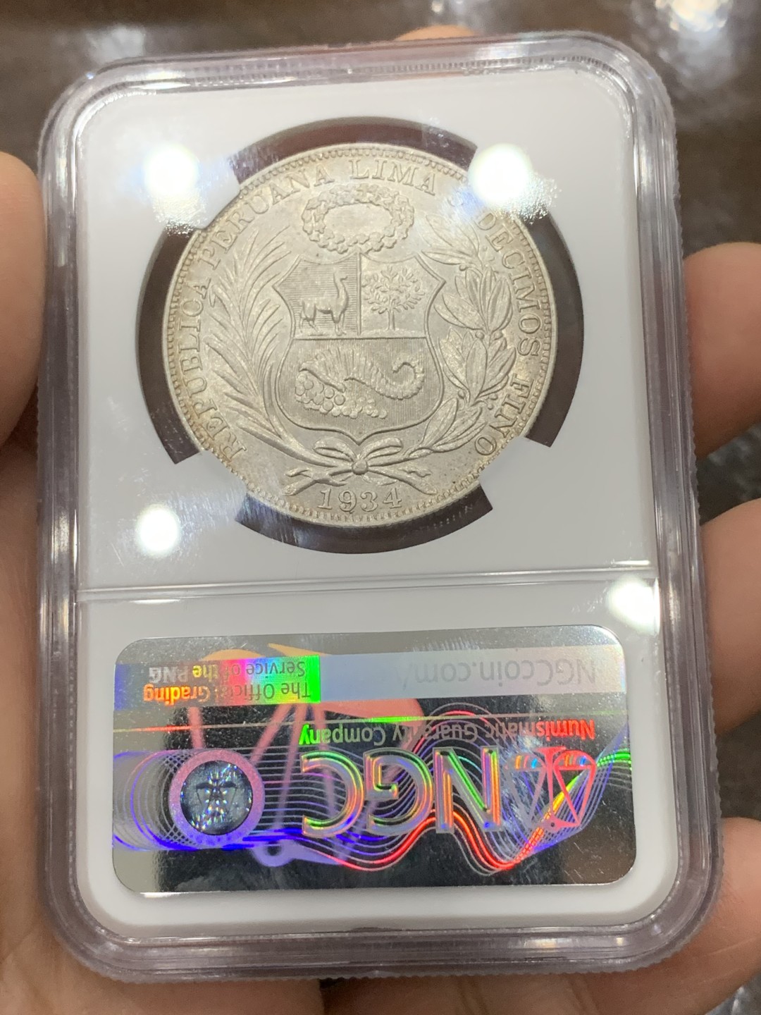 《竞宝斋》第115场-周日，周一 ，2场连拍（全场包邮） NGC-AU58 秘鲁1934年 坐人1索尔大银币 少见品种 低评