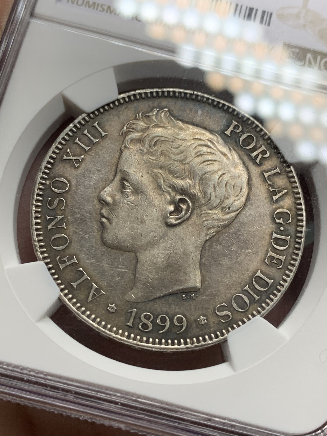 《竞宝斋》第115场-周日，周一 ，2场连拍（全场包邮） NGC-AU58 西班牙 1899 阿方索十三世 5比塞塔 银币 原味包浆 味道不错