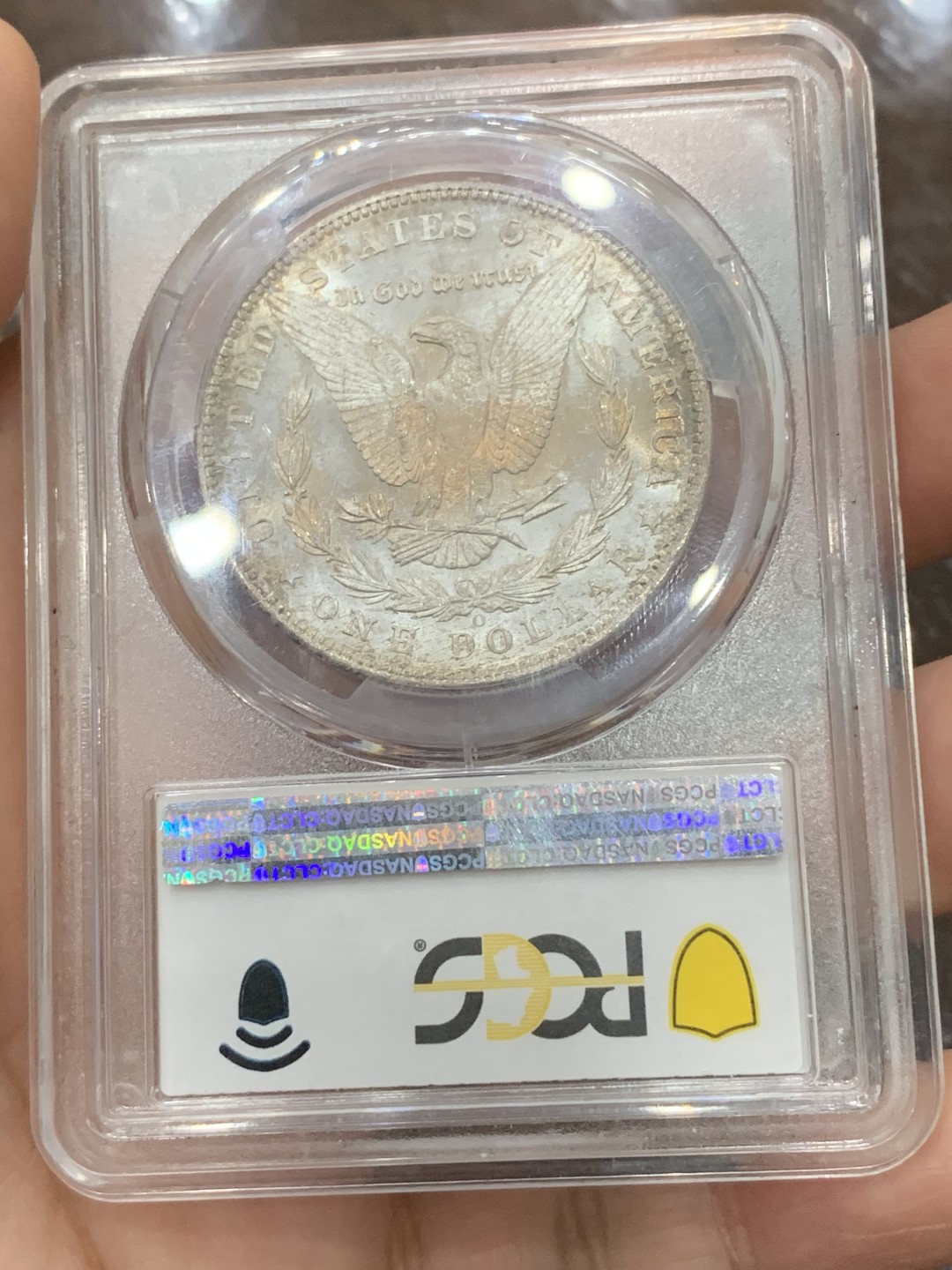 《竞宝斋》第115场-周日，周一 ，2场连拍（全场包邮） PCGS-MS64 美国 1904年 摩根银币 女神面纺织纹 金彩 鹰面淡紫罗兰彩 该币两面具有明显的PL镜面效果