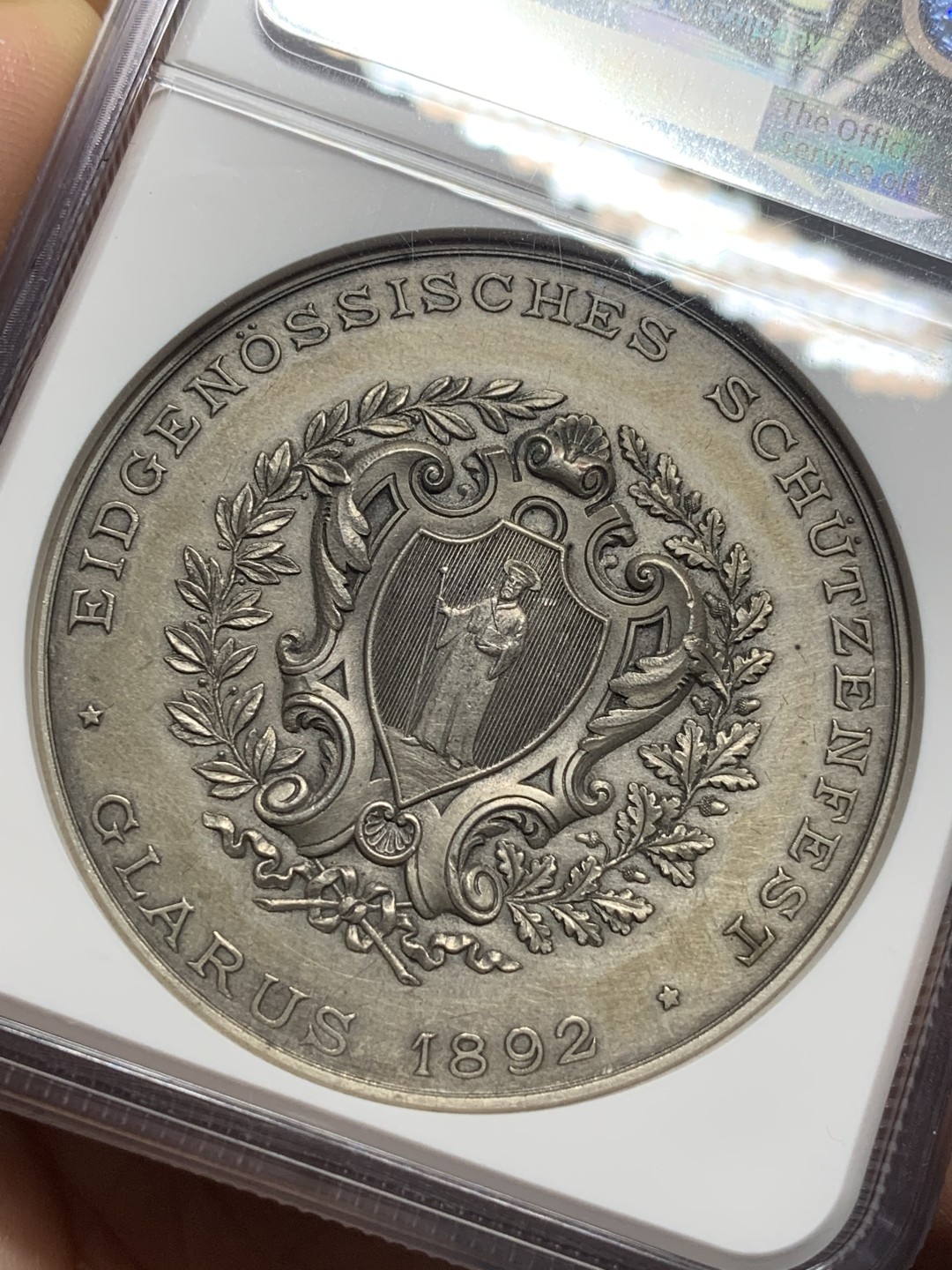 《竞宝斋》第115场-周日，周一 ，2场连拍（全场包邮） NGC MS62 瑞士1892年格拉鲁斯射击节女神大银章 高浮雕加厚评级盒