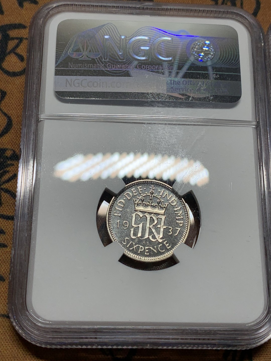 《竞宝斋》第115场-周日，周一 ，2场连拍（全场包邮） NGC-PF64-65 1937年乔治六世加冕首年精制银币，3便士、6便士一对，品相不错，其中一个鼓盒