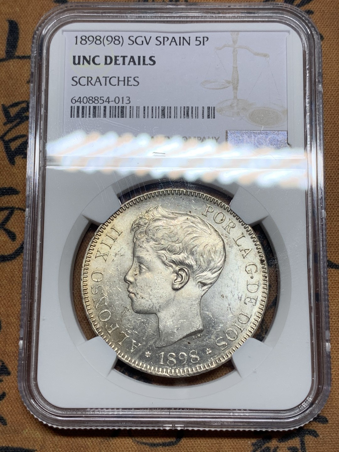 《竞宝斋》第115场-周日，周一 ，2场连拍（全场包邮） NGC UNCD 西班牙1898年双柱5比塞塔大银币