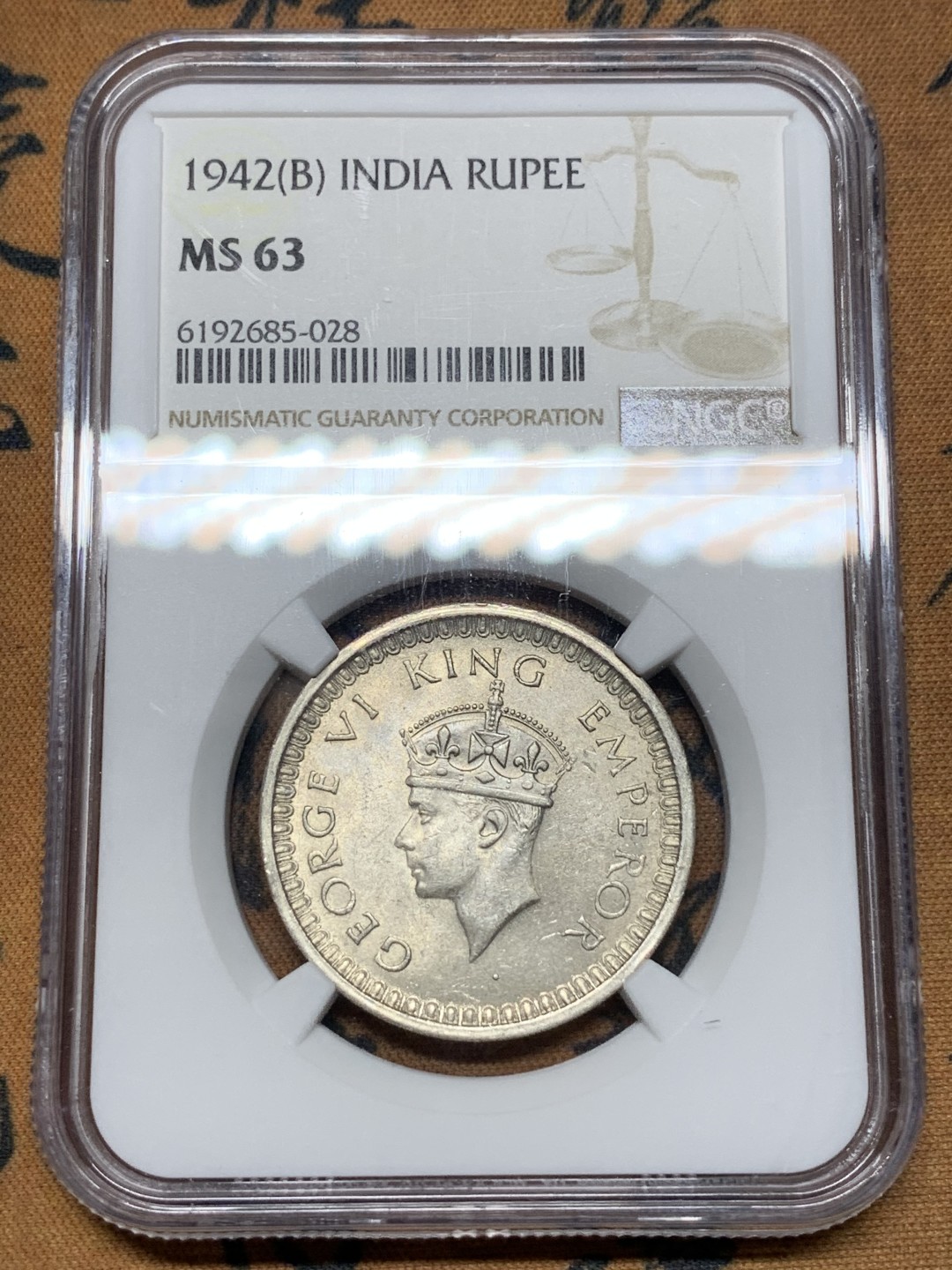 《竞宝斋》第115场-周日，周一 ，2场连拍（全场包邮） NGC-MS63 英属印度 1942年（B） 乔六1卢比银币 凝霜银光状态好