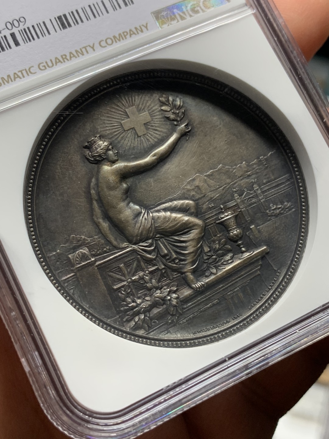 《竞宝斋》第115场-周日，周一 ，2场连拍（全场包邮） NGC MS62 瑞士1895年苏黎世射击节女神大银章 高浮雕加厚评级盒