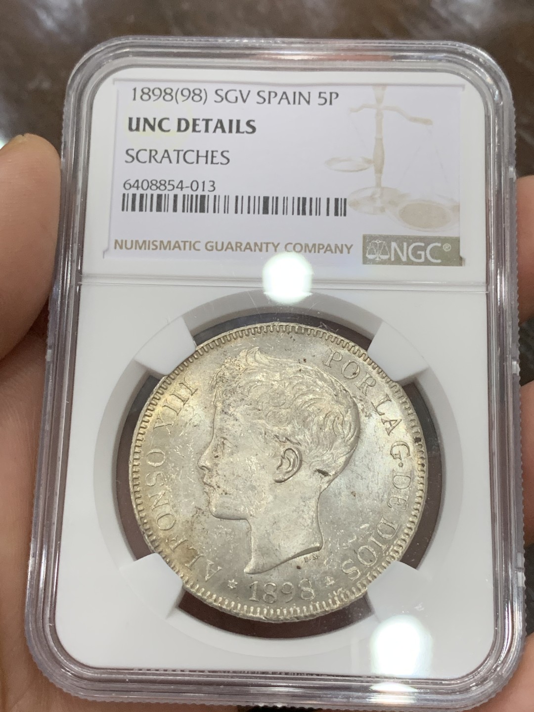 《竞宝斋》第115场-周日，周一 ，2场连拍（全场包邮） NGC UNCD 西班牙1898年双柱5比塞塔大银币