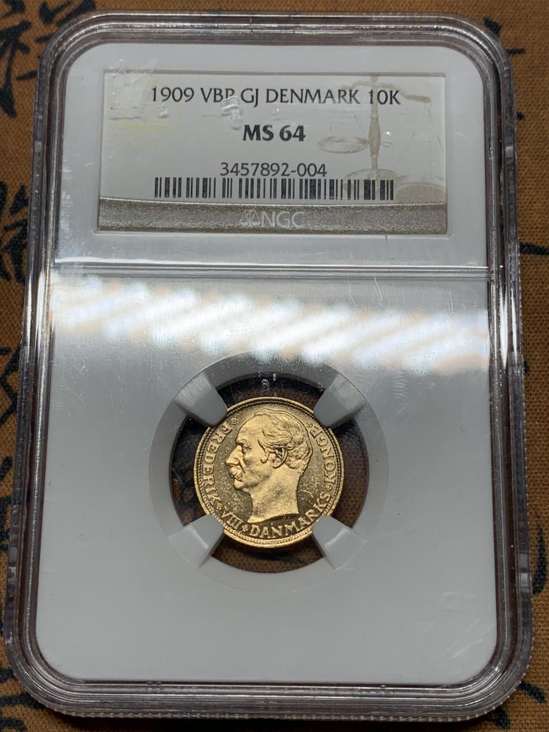 《竞宝斋》第115场-周日，周一 ，2场连拍（全场包邮） NGC MS64 丹麦1909年10克朗金币镜面底板