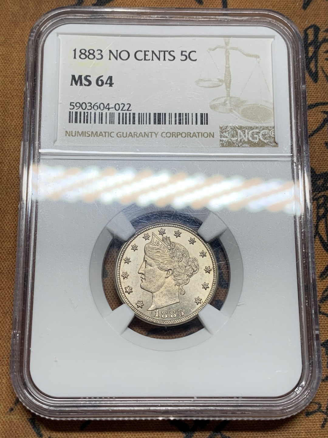 《竞宝斋》第115场-周日，周一 ，2场连拍（全场包邮） NGC-MS64 美国1883 老版5分 无CENTS版本 女神头像发丝和树叶纹路清晰可见 十字转光 难得专挑