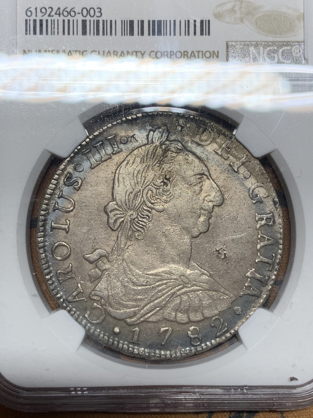 《竞宝斋》第115场-周日，周一 ，2场连拍（全场包邮） NGC AU 评级 玻利维亚 1782年 卡三 8R 双柱 大银币 包浆细节都不错，有小戳