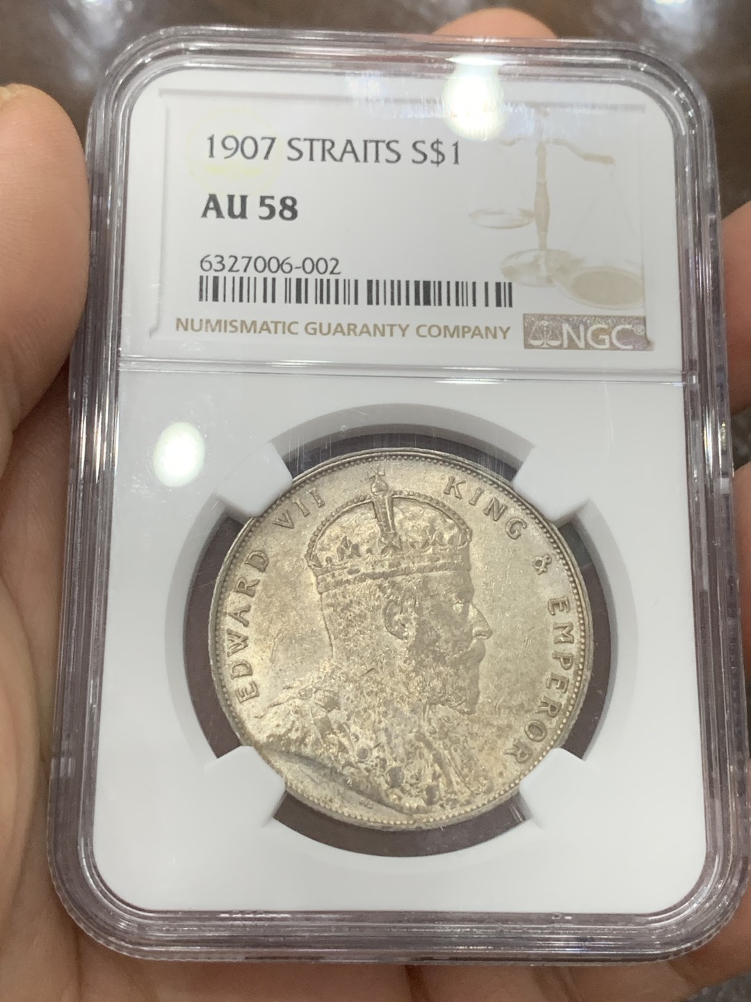 《竞宝斋》第115场-周日，周一 ，2场连拍（全场包邮） NGC AU58 英属海峡1907年爱七一元银币 带光好品