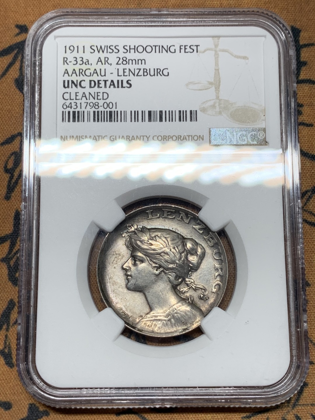 《竞宝斋》第115场-周日，周一 ，2场连拍（全场包邮） NGC UNC 1911年瑞士阿尔高射击节银章，景观设计精美，少见品种