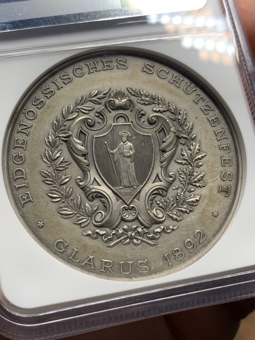 《竞宝斋》第115场-周日，周一 ，2场连拍（全场包邮） NGC MS62 瑞士1892年格拉鲁斯射击节女神大银章 高浮雕加厚评级盒