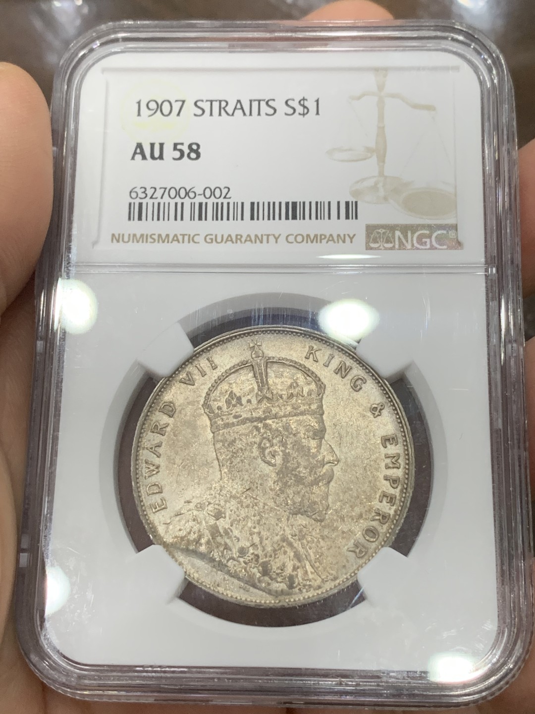 《竞宝斋》第115场-周日，周一 ，2场连拍（全场包邮） NGC AU58 英属海峡1907年爱七一元银币 带光好品