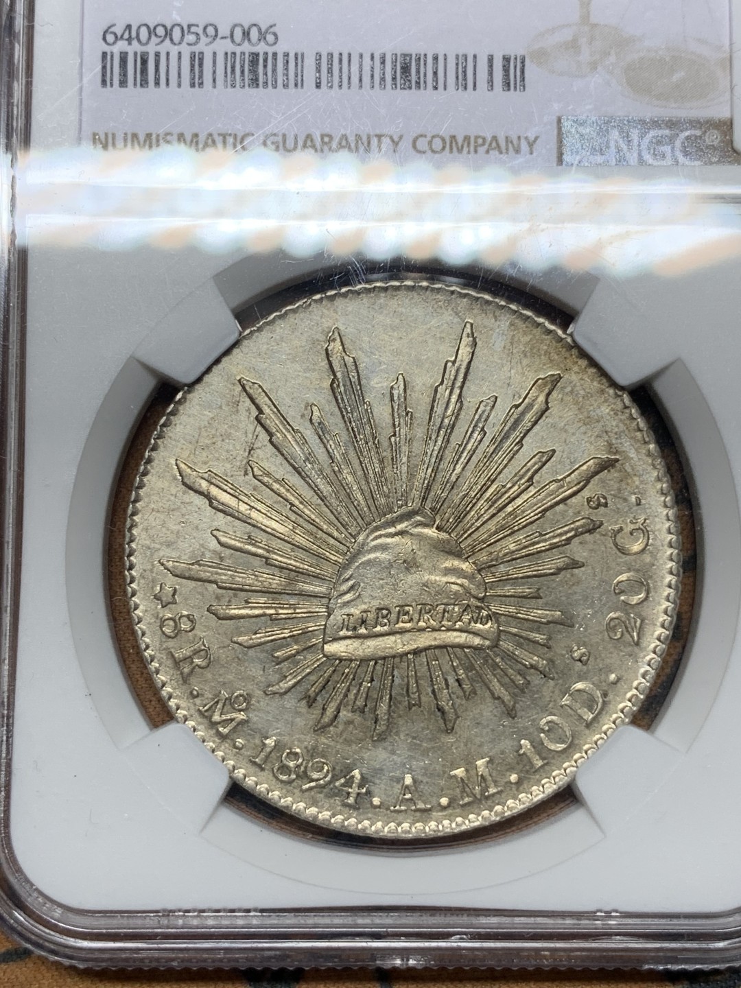 《竞宝斋》第115场-周日，周一 ，2场连拍（全场包邮） NGC UNC 墨西哥 1894年 8R 花边鹰洋 银币 打制压力十足 细节好 全羽不错